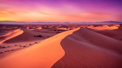 Sunset over a desert landscape, with the shadows of sand dunes stretching long across the barren land, the sky painted with vibrant orange and purple hues.