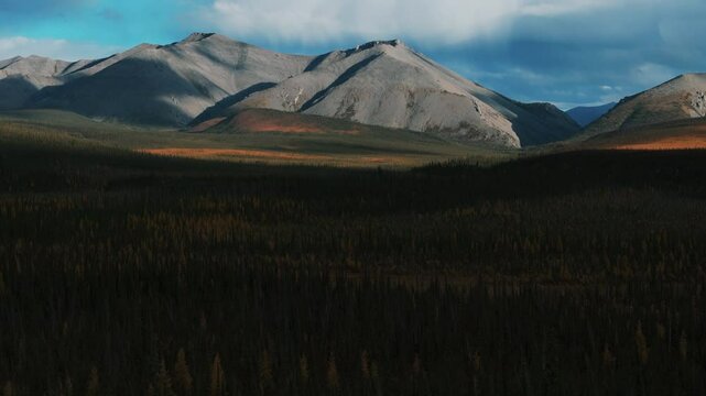 Ogilvie Mountain Range Near Dempster Highway In Yukon, Canada. Aerial Wide Shot