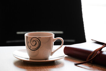 Cup of Black Tea (Coffee) on wooden background 