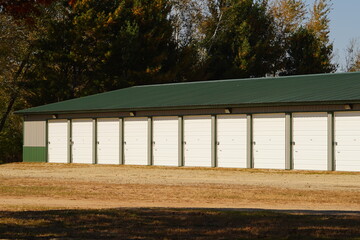 Green and Tan storage units holding the owner's property.