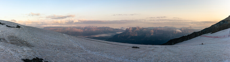 Morning view sunrise on alpien tops valley under dirty de Tête Rousse glacier, france normal wat to top Mont Blanc