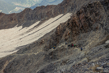 08-26-2021 - Grand couloir, Mont Blanc, France normal way to top over couloir and waiting climbers