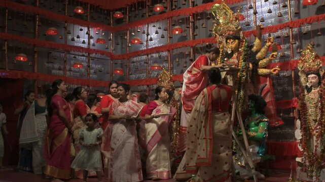 vermilion cerimony in "durga puja" festival event in west bengal, india