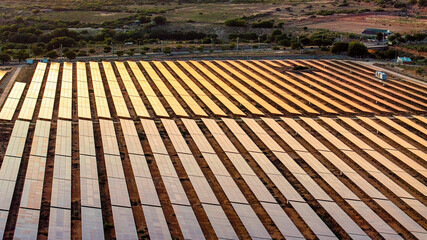 Aerial view of Solar panel, photovoltaic, alternative electricity source - concept of sustainable resources on a sunny day, Phuoc Dinh, Ninh Phuoc, Ninh Thuan, Vietnam