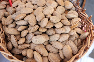 Raw Almonds Presented in a Beautiful Rustic Basket A Wonderful Healthy Snack Option