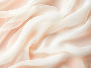 Fototapeta premium Delicate silk fabric in soft white and peach tones, creating a serene and elegant background for design projects.