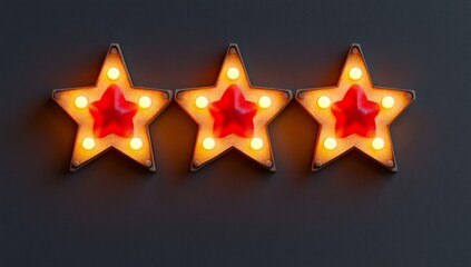 Obraz premium Three illuminated star shapes with red centers and warm light bulbs arranged in a row against a dark background