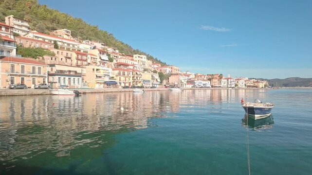Scenic Greek town Gytheio reflected in calm harbour waterfront