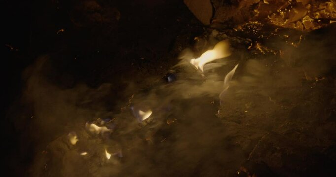 Campfire burning in the night