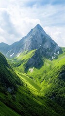Fototapeta premium Majestic Mountain Peaks Surrounded by Lush Green Valleys Under a Soft Blue Sky