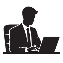 Silhouette of a businessman working on a laptop computer.