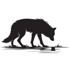 Silhouette of a wolf standing by a lake, looking down at the water.