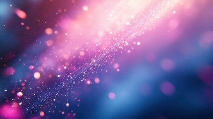 A vibrant abstract background with sparkling particles in shades of pink and blue.