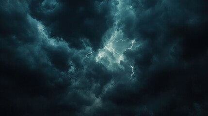Obraz premium Dark storm clouds illuminated by flashes of lightning, creating a dramatic atmosphere.