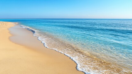 Obraz premium Tranquil Beach Scene with Golden Sand and Crystal Clear Blue Water