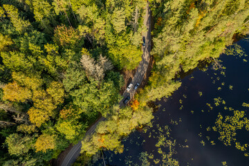 Aerial autumn morning view of colouful trees, forest, Green lakes (Zalieji ezerai) in Vilnius, Lithuania