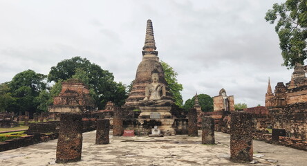 Ancient s
tatue of Buddha at the Sukhothai Historical Park, Sukhothai, Thailand