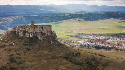Fototapeta premium Majestic Aerial Drone View of Spis Castle in Slovakia's Scenic Countryside