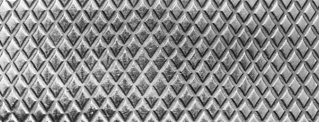 Metal texture with diamond pattern. Abstract background of steel. Banner.