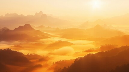 Obraz premium Sunrise Over Rolling Foggy Mountain Landscape