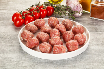 Uncooked raw beef meatball minced