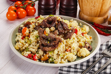 Traditional couscous with beef and vegetables