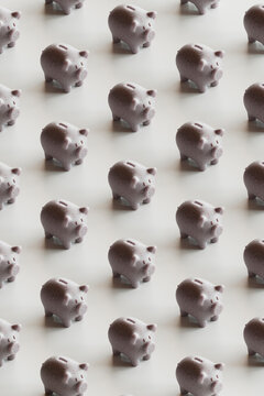 Seamless pattern of piggy banks over white background