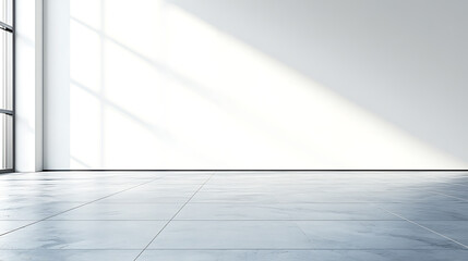 Fototapeta premium A clean and modern interior space with large windows and a concrete floor. The light from the window casts soft shadows on the wall and floor, creating a sense of calm and tranquility.