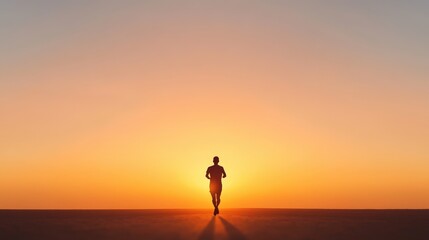 silhouette of person running at sunset