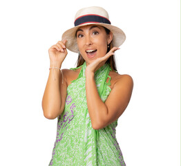 Naklejka premium Portrait of happy young woman in summer clothing and straw hat isolated over transparent background.