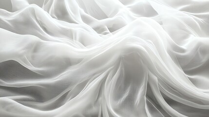 Obraz premium Soft, white fabric drapes in elegant folds, creating a delicate and ethereal background.