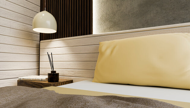 Pendant light hanging over table near bed in modern bedroom