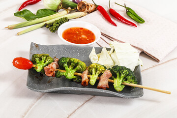 Thai Street foof satay with bacon and broccoli