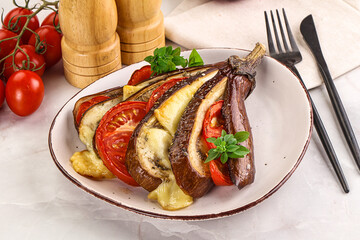 Baked tomato with mozzarella and tomato