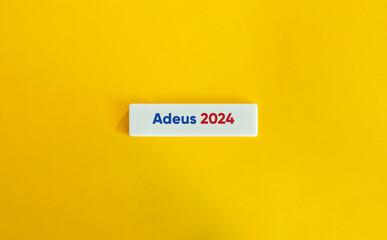 Goodbye 2024 Banner. Greetings, Motivational Phrase, Positive Emotion, Slogan, or Quote. Blue and Red Text on Block Letter Tile on Yellow Background.