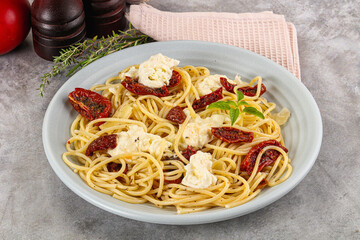 Italian spaghetti with stracciatella and tomato