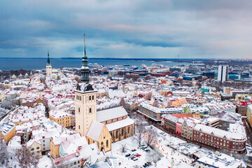 Aerial View of Tallinn in winter, roofs are covered with snow, Christmas mood