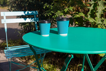 Outdoor Coffee on a Bright Green Table