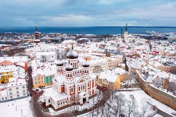 Aerial View of Tallinn in winter with Alexander Nevsky Cathedral, roofs with snow, Christmas mood