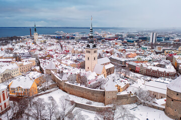 Aerial View of Tallinn in winter, roofs are covered with snow, Christmas mood