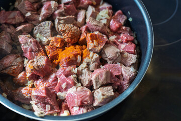 famous hungarian red pepper paprika as an ingredient of the traditional stew or gulasch