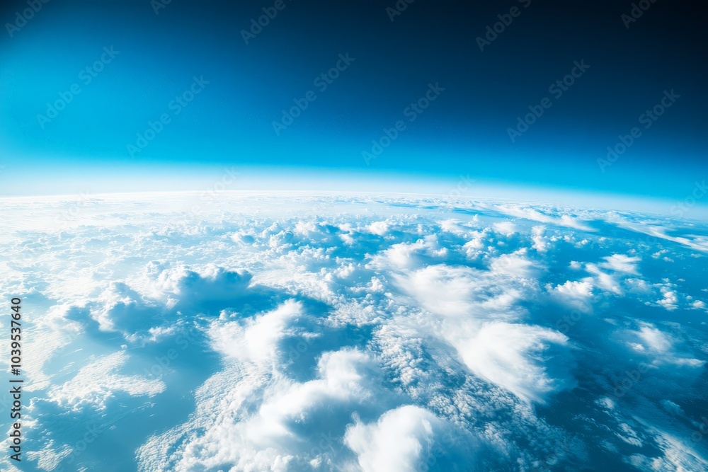 Poster a dreamy panorama where fluffy white clouds float beneath a rich, deep blue sky, creating a magnific