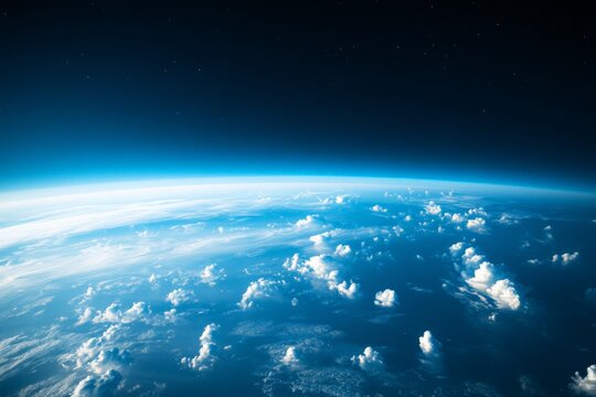 A mesmerizing scene of Earth's curvature blending into the dark star-speckled cosmos above, stirring thoughts of exploration, infinity, and the mysteries of space.