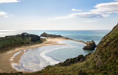 The view from Deliverance Cove track. Castlepoint lighthouse in the distance. Wairarapa. New...