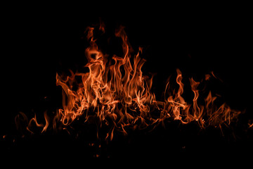 Texture of fire on black background. Hell bonfire. Texture of fire on a black background. Fire over...