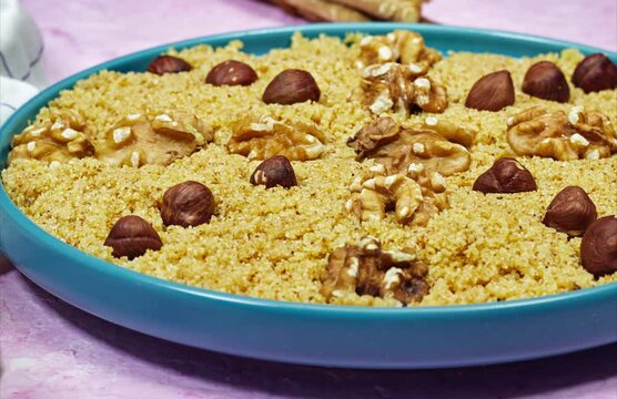 tamina is the name of algerian food is base with semolina and honey, this is a tradition sweet food for mawlid or ramadan