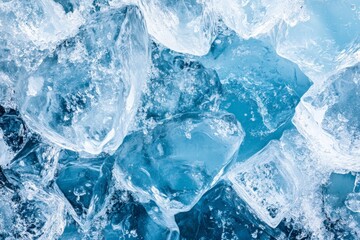 Intricate arrangement of blue ice cubes, this high-detail image focuses on the icy texture and the artistic aspect of natural symmetrical formations.