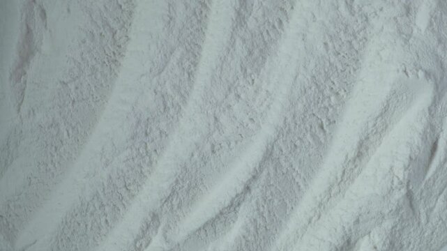 Sodium Carboxymethyl Cellulose Powder, NaCMC, close-up. Food additive E466, effective water binders for use in food and non-food applications.