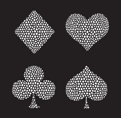 Vector symbols of playing cards on black background.