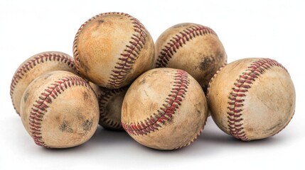 Group of baseballs stacked together, showing different angles of stitching, isolated on white background